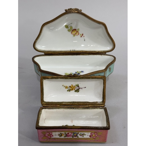 24 - Two late 19th century French porcelain and gilt mounted boxes, one of fan shape polychrome painted w... 