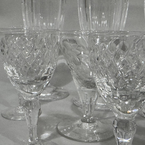 253 - A set of six Villeroy & Boch wine flutes of slice cut together with a set of six Brierley cut glass ... 