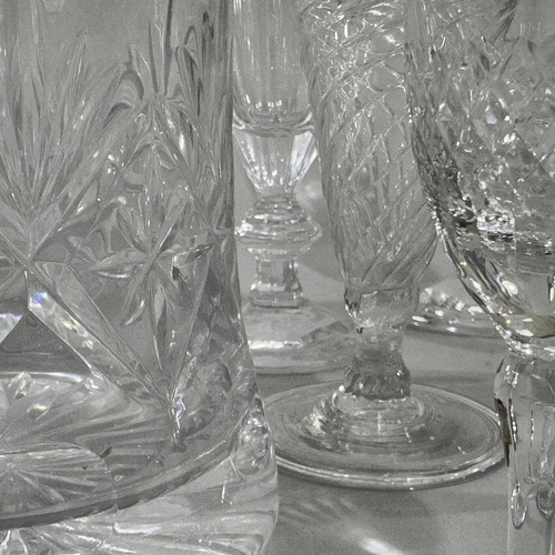 253 - A set of six Villeroy & Boch wine flutes of slice cut together with a set of six Brierley cut glass ... 