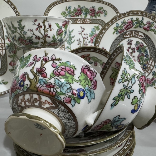 242 - A Victorian white and lavender sprigged tea ware, two Victorian pottery vases and a blue banded tea ... 