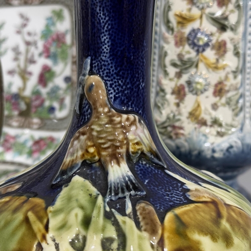 242 - A Victorian white and lavender sprigged tea ware, two Victorian pottery vases and a blue banded tea ... 