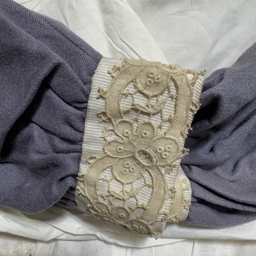 327 - A Victorian young girl's outfit in mid blue wool cloth with lace edged cream bodice, full skirt, tog... 