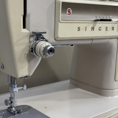 287 - A Singer electric sewing machine