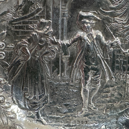 341 - A Danish silver trinket dish embossed with a gentleman and his wife with C-scrolls, rocaille and fru... 