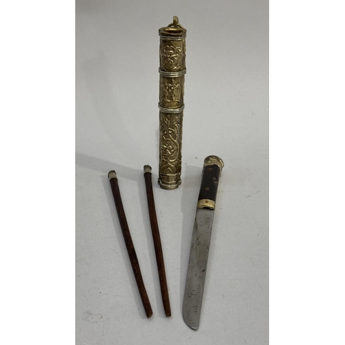 58 - A 19th century wood and bone handled knife and two chopsticks held in a brass holder embossed with a... 