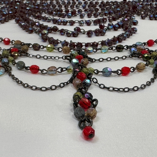 369 - A suite of necklace and bracelet with red facetted paste brilloettes, together with a suite of neckl... 