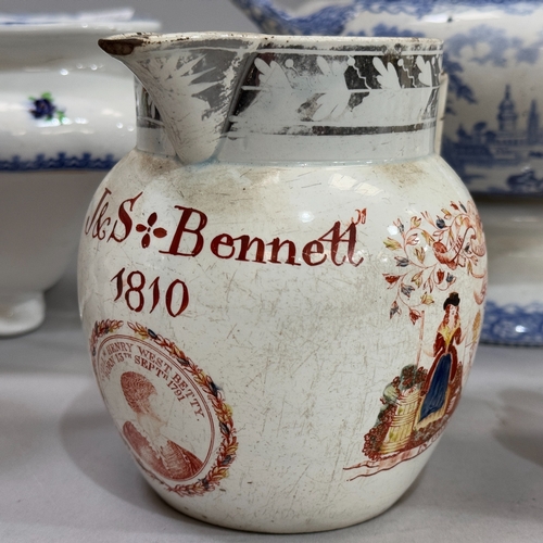 268 - An early 19th century pearl ware jug with silver lustre rim printed with farming scenes and The Farm... 