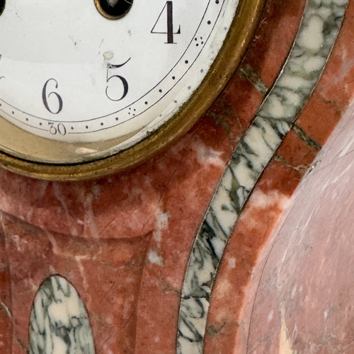 440 - A Victorian rouge and grey marble balloon shaped clock having a white enamel dial with black Arabic ... 