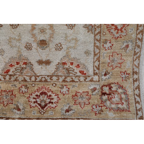 236 - A FARHAN (PAKISTAN) RUNNER, wool on cotton foundation, in pale shades of camel and almond with fox r... 