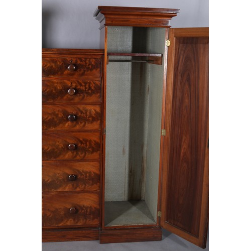 413 - AN EARLY VICTORIAN FIGURED MAHOGANY WARDROBE-CHEST, the centre section having two dummy drawer cupbo... 