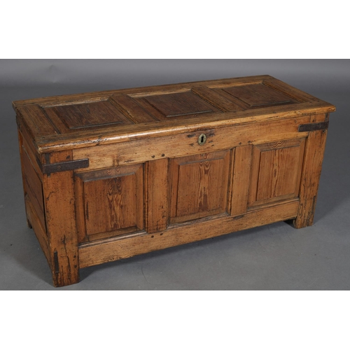 467 - AN 18TH CENTURY PINE JOINED CHEST having a triple field panel top and conforming front, on stile leg... 