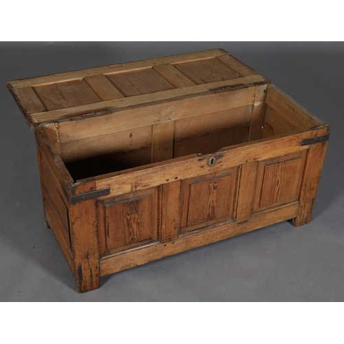 467 - AN 18TH CENTURY PINE JOINED CHEST having a triple field panel top and conforming front, on stile leg... 