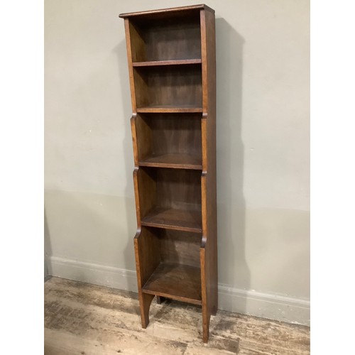 389 - An oak waterfall bookcase, five height on bracket feet, adapted to fit in alcove, 36cm wide x 153cm ... 