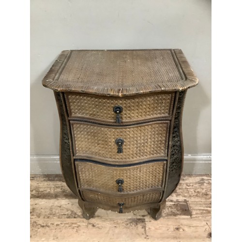 436 - A small serpentine fronted chest of drawers, four graduated drawers and with can covering, 49cm wide