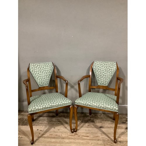 462 - A pair of deco walnut armchairs with green upholstered seats, on cabriole legs