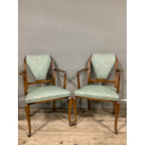 462 - A pair of deco walnut armchairs with green upholstered seats, on cabriole legs