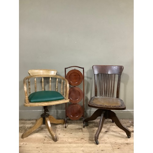 463 - Two 1930s oak office chairs together with an inlaid cake stand