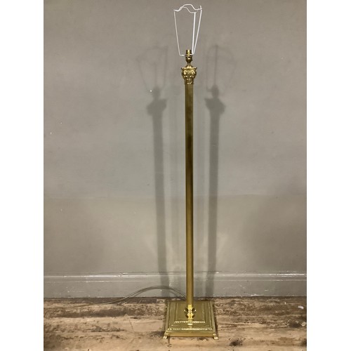 401 - A reproduction brass standard lamp on Corinthian column and on square base