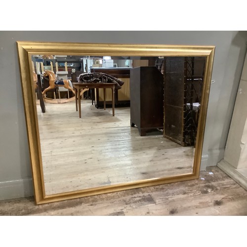 300 - A large bevelled gilt framed wall mirror, 104cm x 127cm