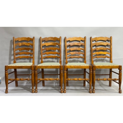 465 - A set of four reproduction ladder back kitchen chairs, on turned legs