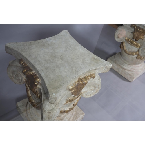 168 - A large glass dining table, rectangular, on two faux stone pedestals of urn and scroll design with g... 