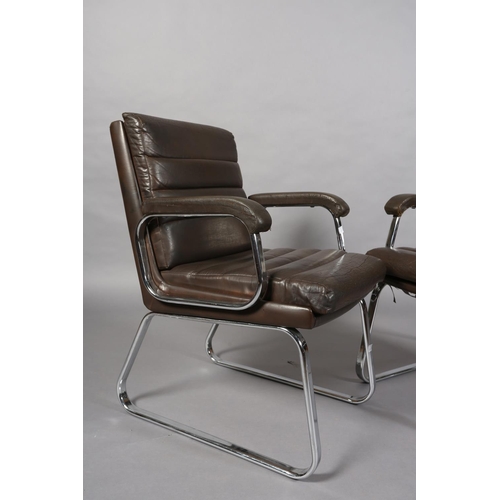 25 - Gordon Russell for Verco, c1970s, a pair of brown leather and chrome office desk chairs