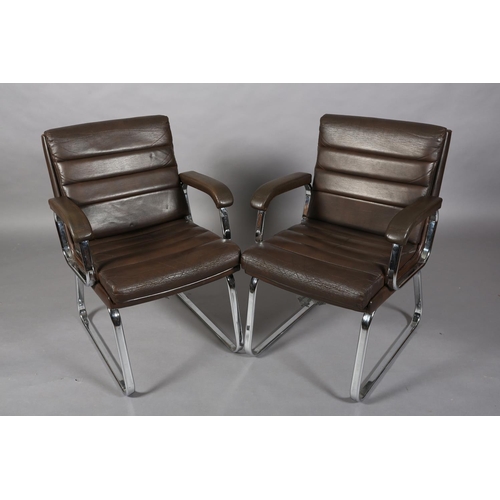 26 - Gordon Russell for Verco, c1970s, a pair of brown leather and chrome office desk chairs