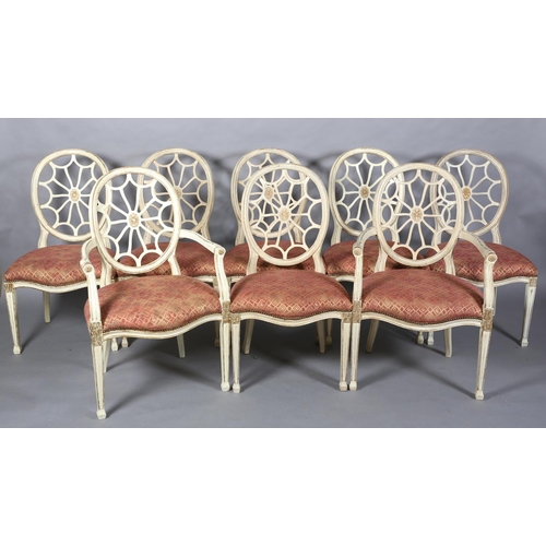 169 - A set of eight Regency style cream and gilt dining chairs with oval pierced backs and moulded frame,... 