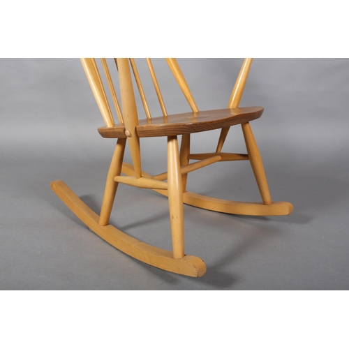 31 - An Ercol Quaker beech rocking chair, model 428 with natural elm seat