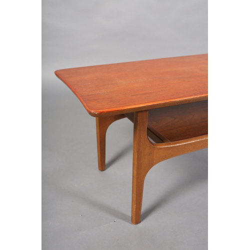 135 - A teak coffee table, c1970s, in the manner of Richard Hornby, rectangular and tapered with undertier... 