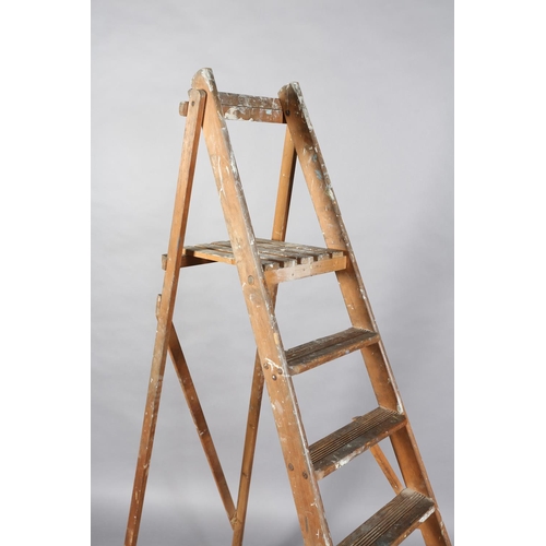 159 - A set of mid 20th century wooden step ladders, 182cm high max