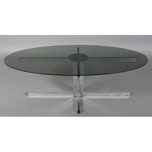 27 - A Pieff chrome and smoked glass coffee table, of oval outline on cross-form legs, 122cm long x 61cm ... 