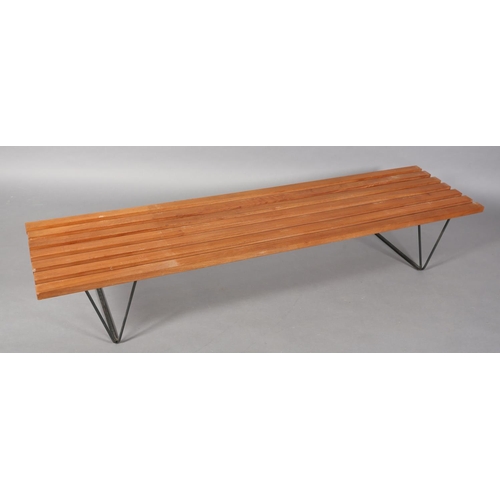 1 - Robin Day (1915-2010) for Hille's Interplan Range c1955, a mahogany slatted bench on black metal rod... 