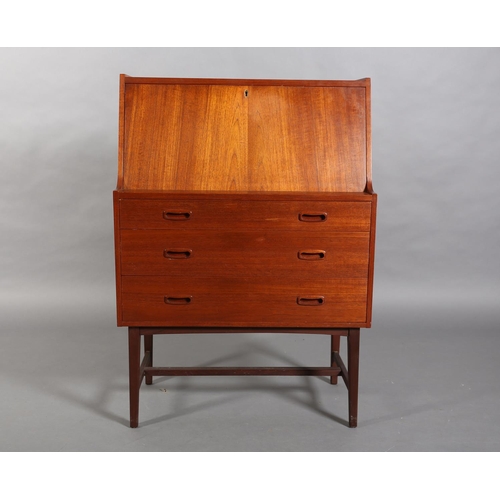 54 - A Danish teak bureau, c1970s, fall front, fitted interior, over three graduated drawers, on tapered ... 