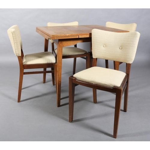 67 - An early G Plan walnut dining suite, c1960s, extending rectangular table on splayed legs and a set o... 