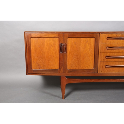 70 - A G Plan Fresco teak sideboard, c1970s, having four drawers to the centre flanked by a two door cupb... 