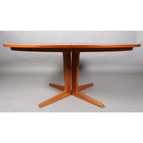 75 - A Bernhard Pedersen teak oval extending dining table, oval on a four section pedestal and feet, with... 