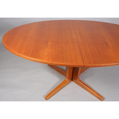 75 - A Bernhard Pedersen teak oval extending dining table, oval on a four section pedestal and feet, with... 