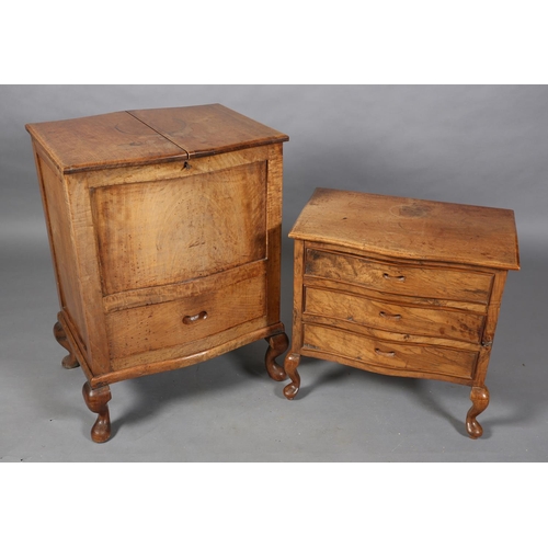 109 - An Anglo-Indian fruitwood serpentine drinks cabinet, c1930s, having a twin fold-out top with rising ... 