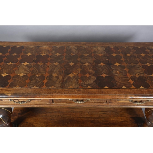 131 - An Italian hardwood hall or serving table, rectangular, having three drawers to the apron with brass... 