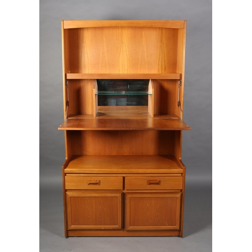 119 - A teak wall unit by William Lawrence of Nottingham, c1970s, having an open glass lined shelf above a... 