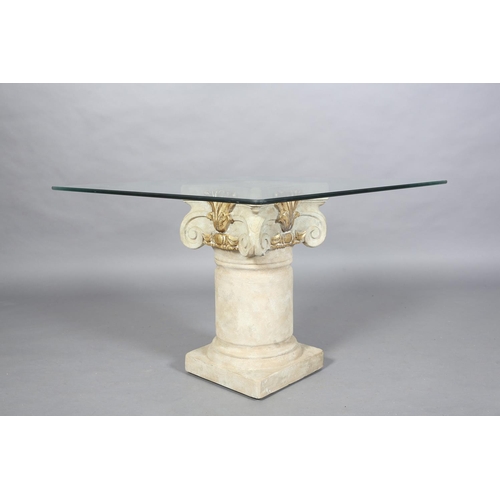 169B - A glass topped occasional table, square on a faux stone ionic column, pedestal with gilt highlights,... 