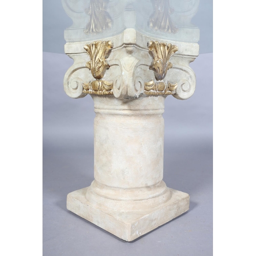 169B - A glass topped occasional table, square on a faux stone ionic column, pedestal with gilt highlights,... 