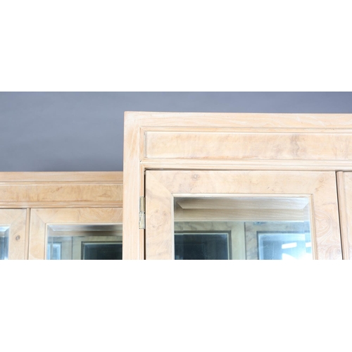 148 - A pair of pale maple and glazed Heritage Connoisseur display cabinets by Drexler, mirror lined with ... 