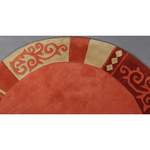 102 - Theko Ambadi rug, circular, in salmon pink, cream and russett, 152cm diameter