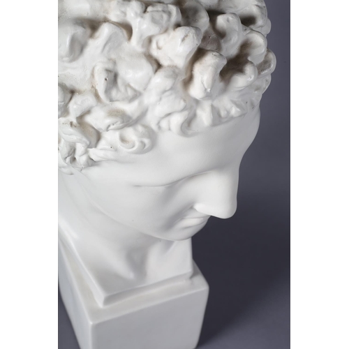 172 - A ceramic classical bust of a Greek male, on square plinth, 61cm high