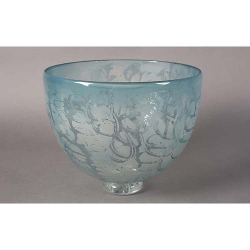 173 - Julie Charles, A blue tinted and etched glass bowl, on clear glass foot, 26.5cm diameter x 21.5cm hi... 