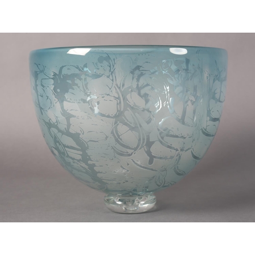 173 - Julie Charles, A blue tinted and etched glass bowl, on clear glass foot, 26.5cm diameter x 21.5cm hi... 