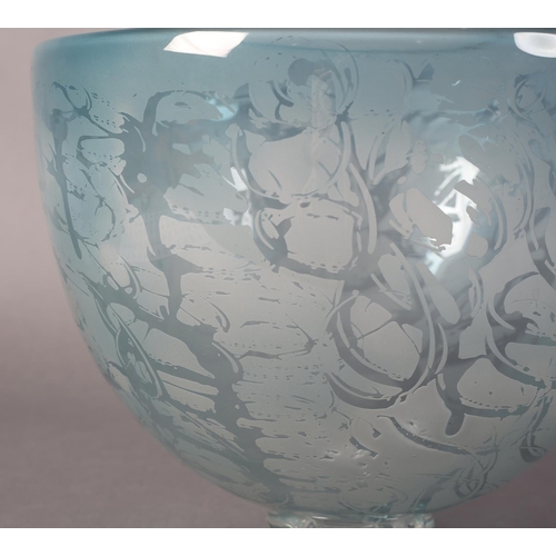 173 - Julie Charles, A blue tinted and etched glass bowl, on clear glass foot, 26.5cm diameter x 21.5cm hi... 