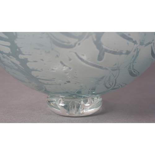 173 - Julie Charles, A blue tinted and etched glass bowl, on clear glass foot, 26.5cm diameter x 21.5cm hi... 